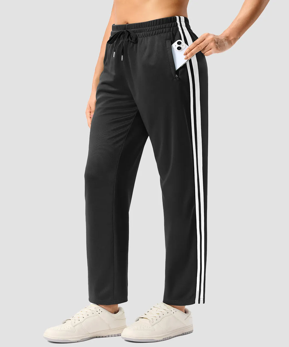 women's contrast stripe zip pockets track pants 28'' in black - pocket detail view