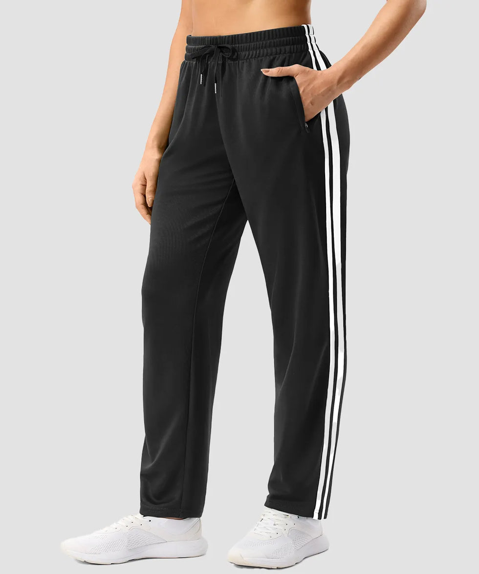 women's contrast stripe zip pockets track pants 30''/32'' in black - pocket detail view