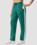 women's contrast stripe zip pockets track pants 30''/32'' in forest green - pocket detail