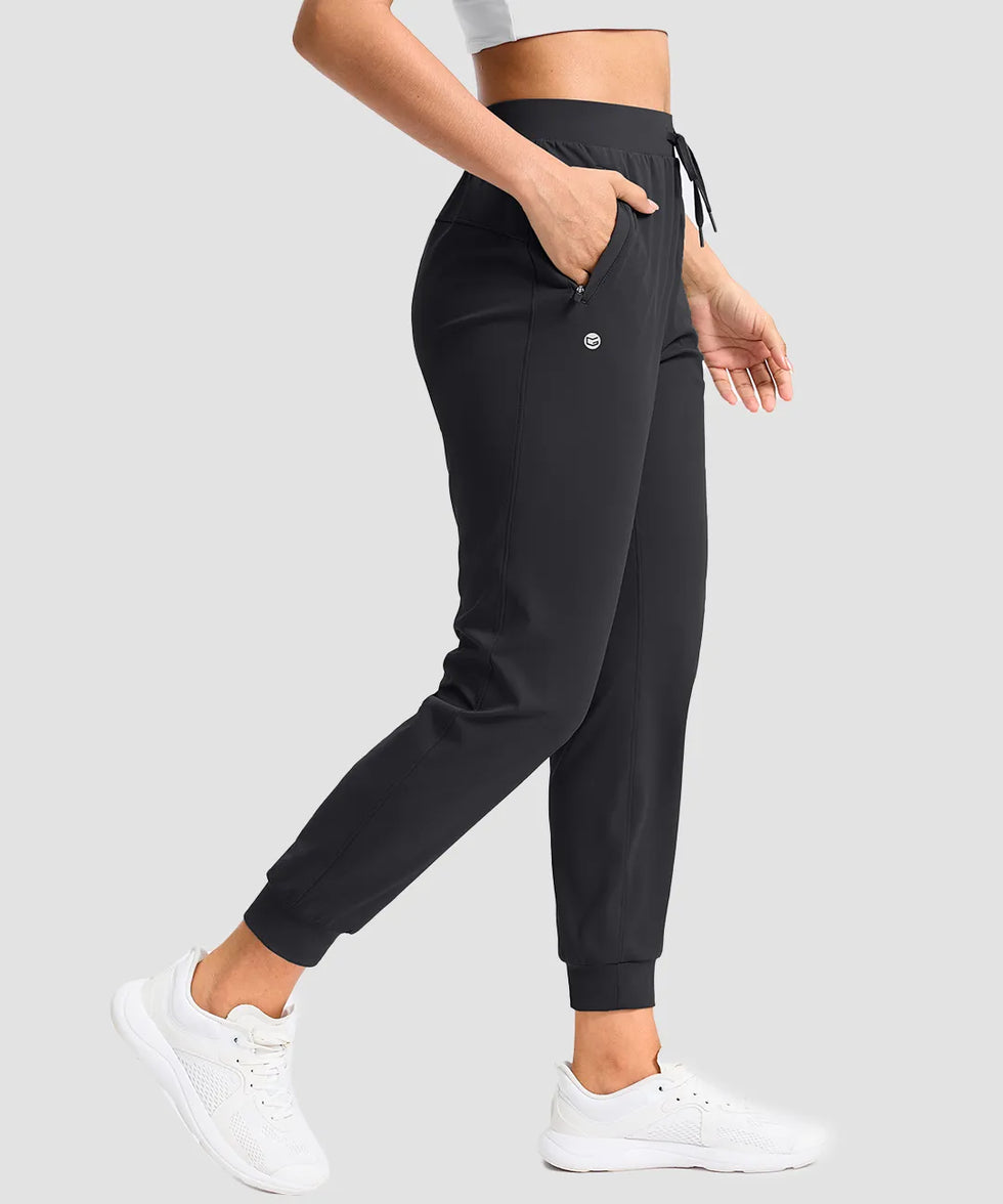 women's drawstring mid waist joggers in black - side view