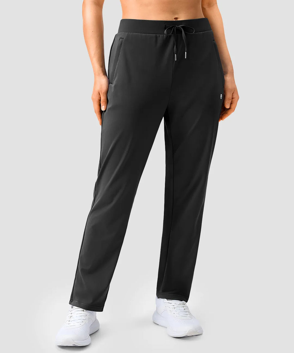women's elastic waist 2 zip pockets track pants in black - front view