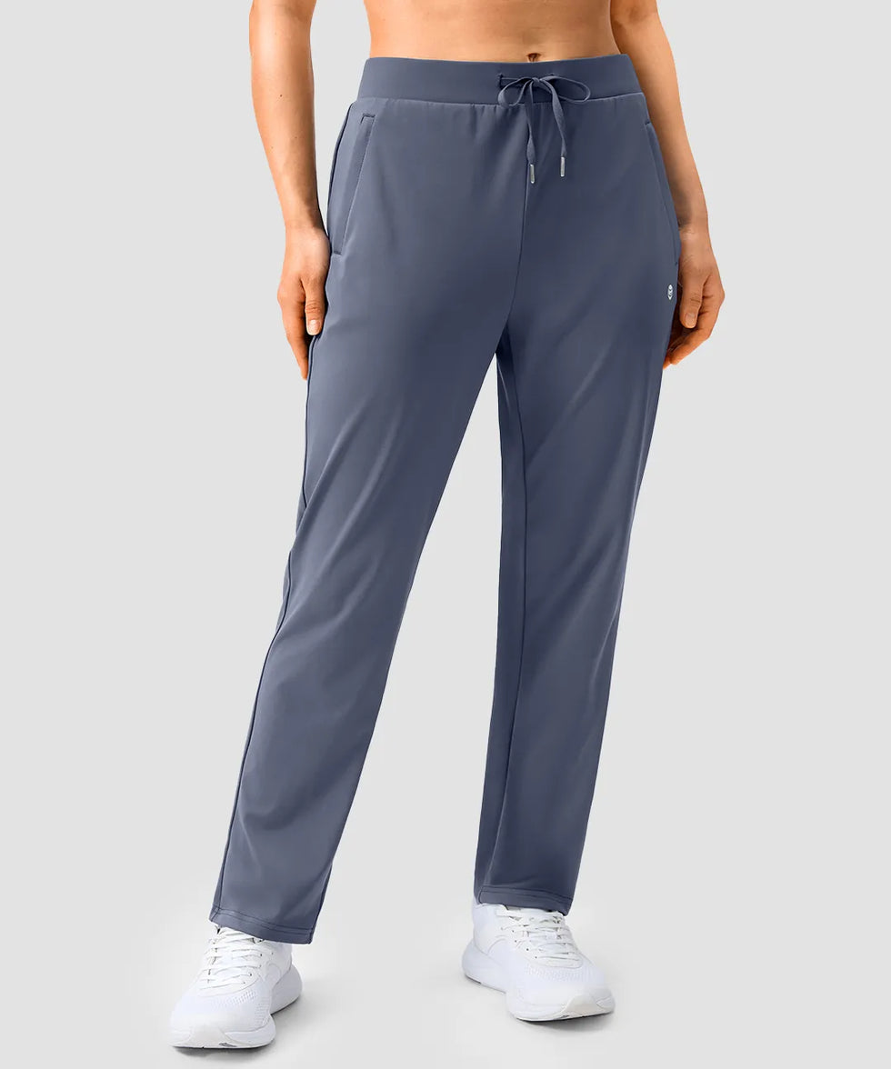 women's elastic waist 2 zip pockets track pants in dusty blue - front view