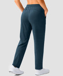 women's elastic waist 2 zip pockets track pants in heather blue - back view