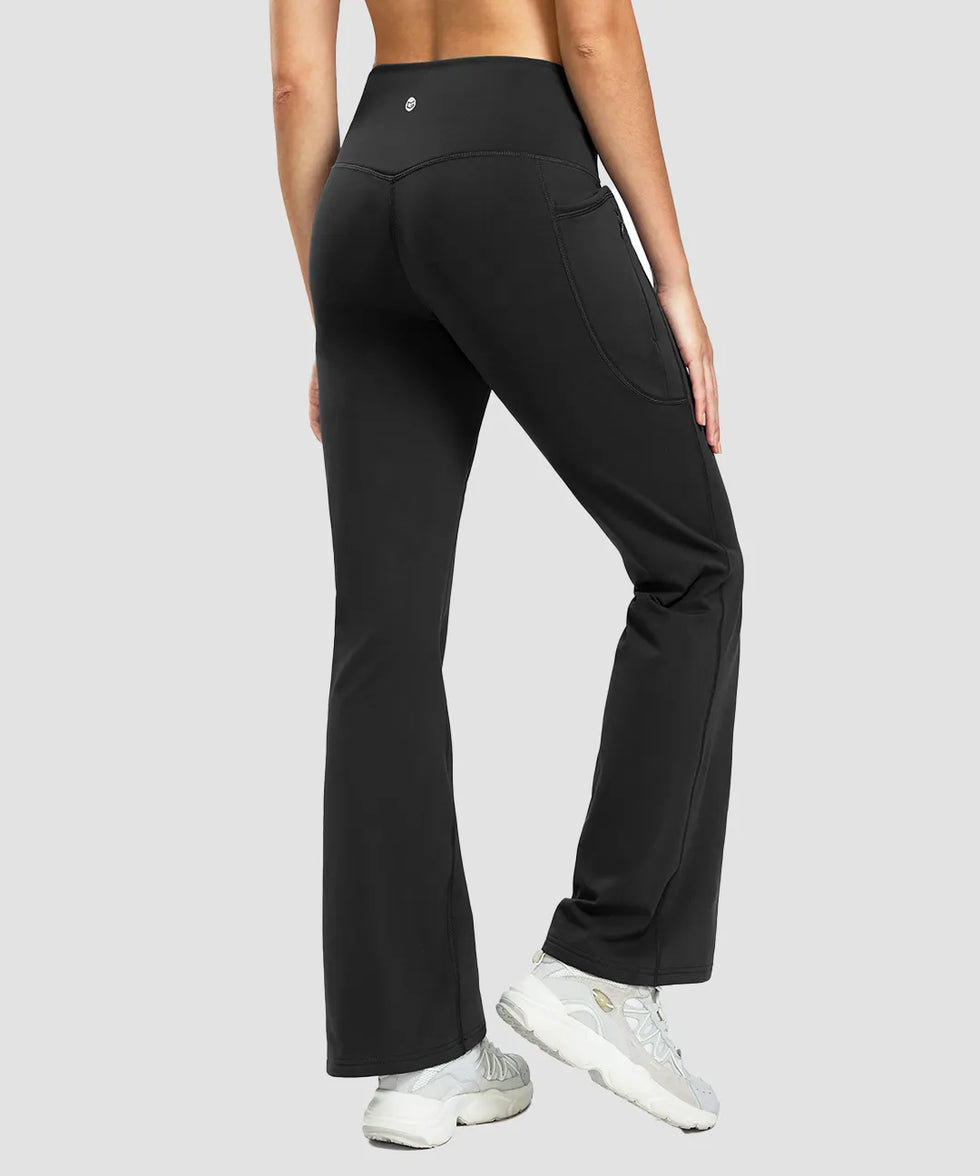women's fleece lining zip pockets flare leggings in black - back view