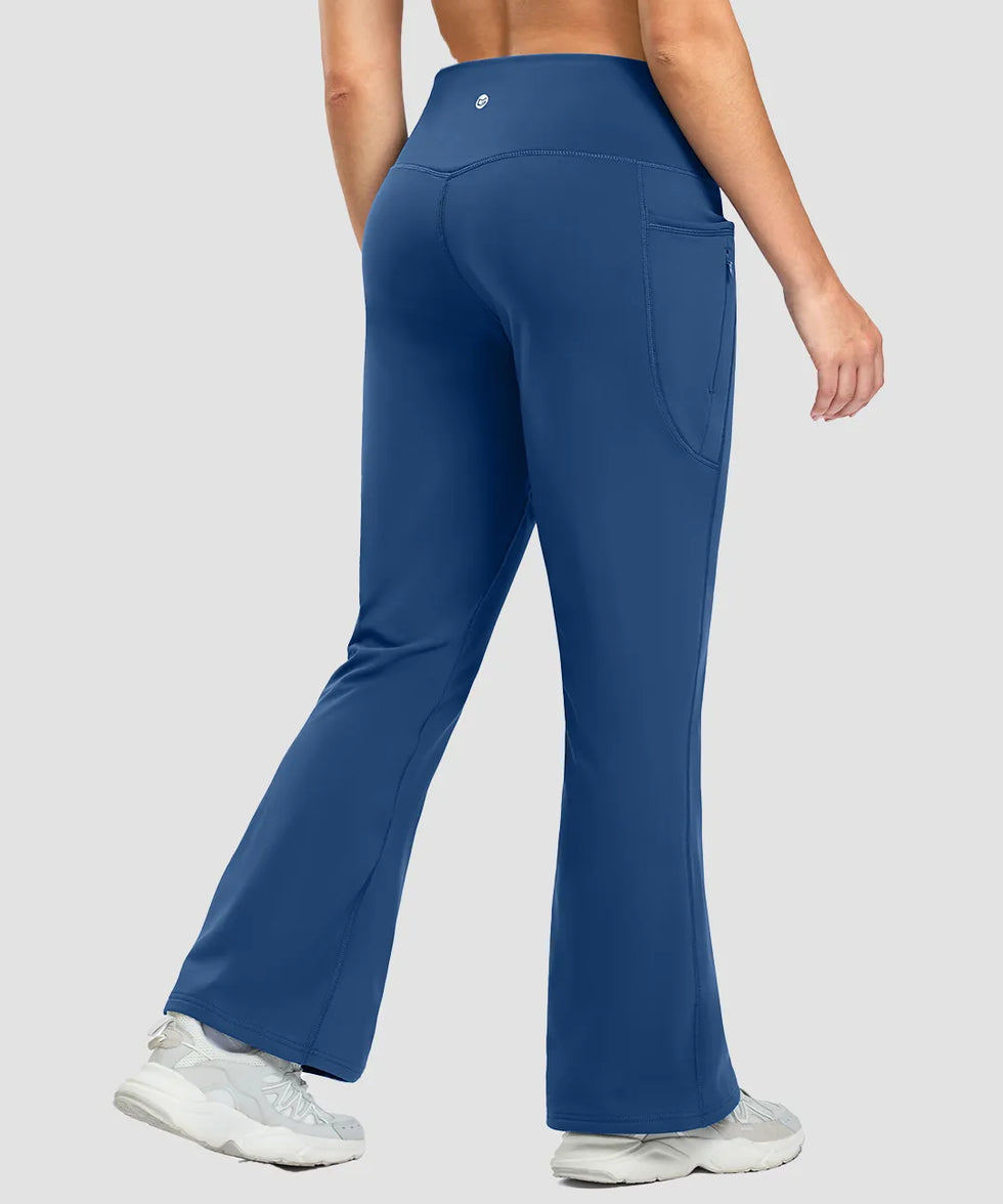 women's fleece lining zip pockets flare leggings in blue - back view