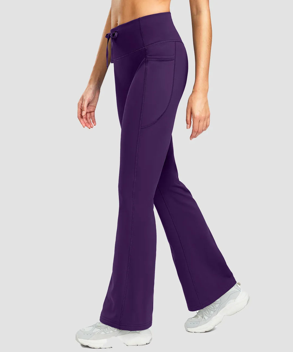 women's fleece lining zip pockets flare leggings in deep purple - side view