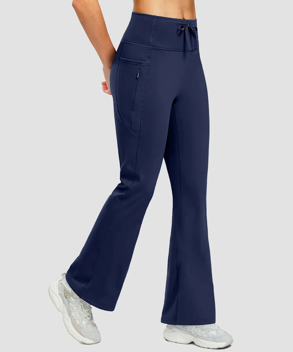 women's fleece lining zip pockets flare leggings in navy - zipper pocket detail view