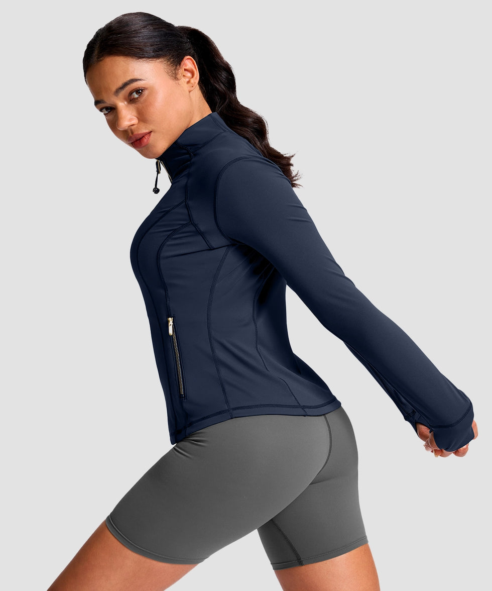 women's longline slim full zip pocketed workout jacket in navy with gold zipper - side view