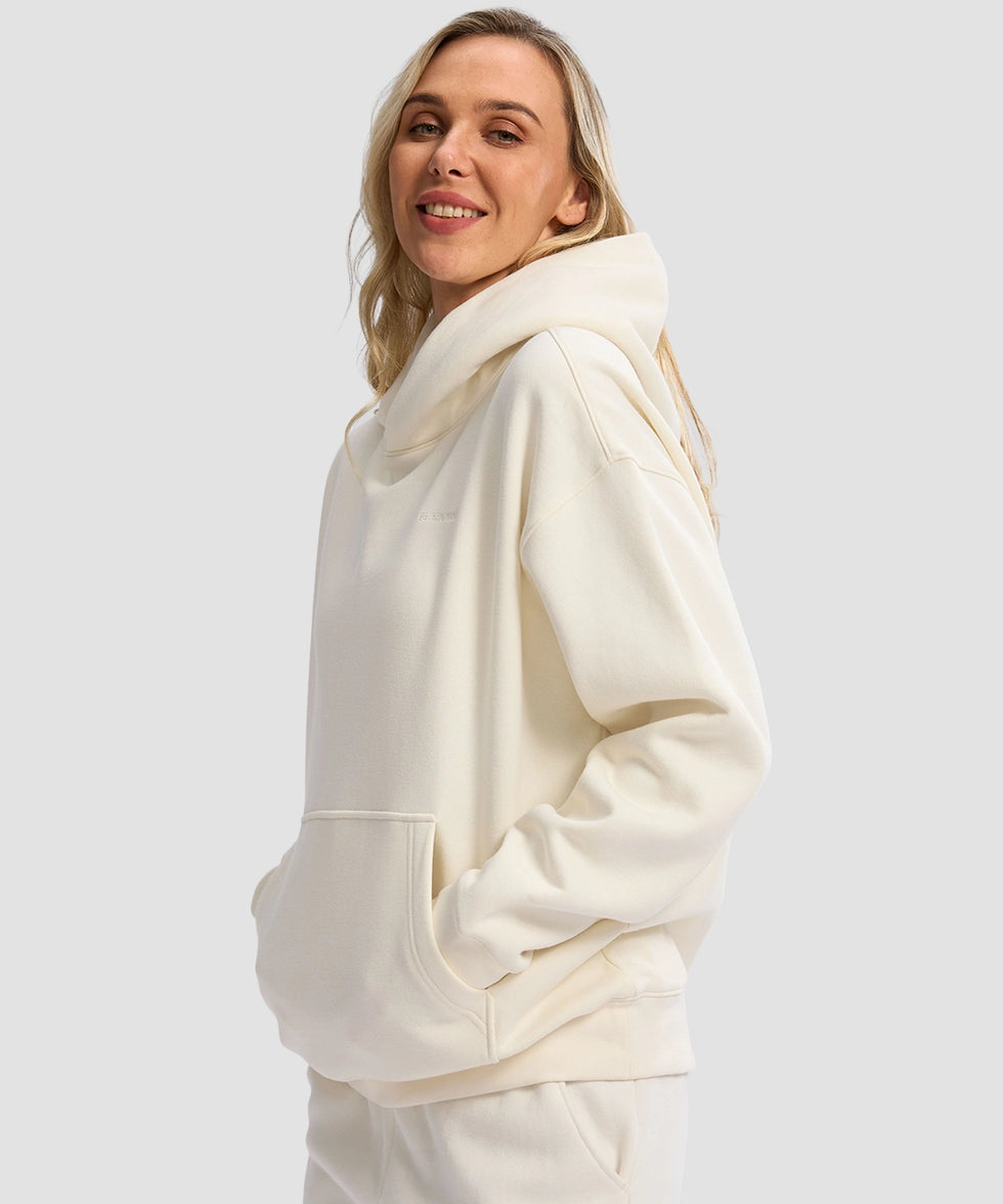women's solid color oversized fleece hoodie in beige - side view