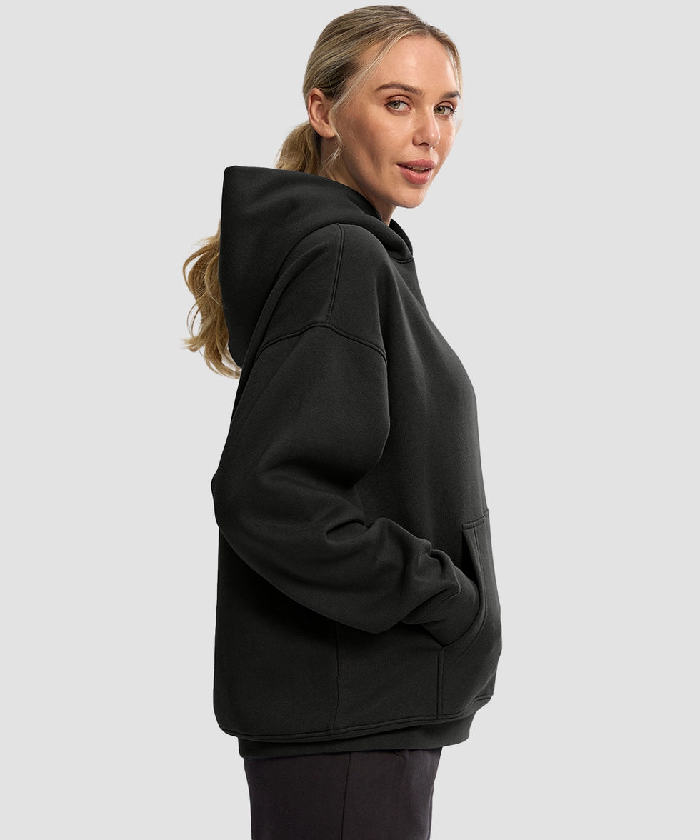 women's solid color oversized fleece hoodie in black - side view