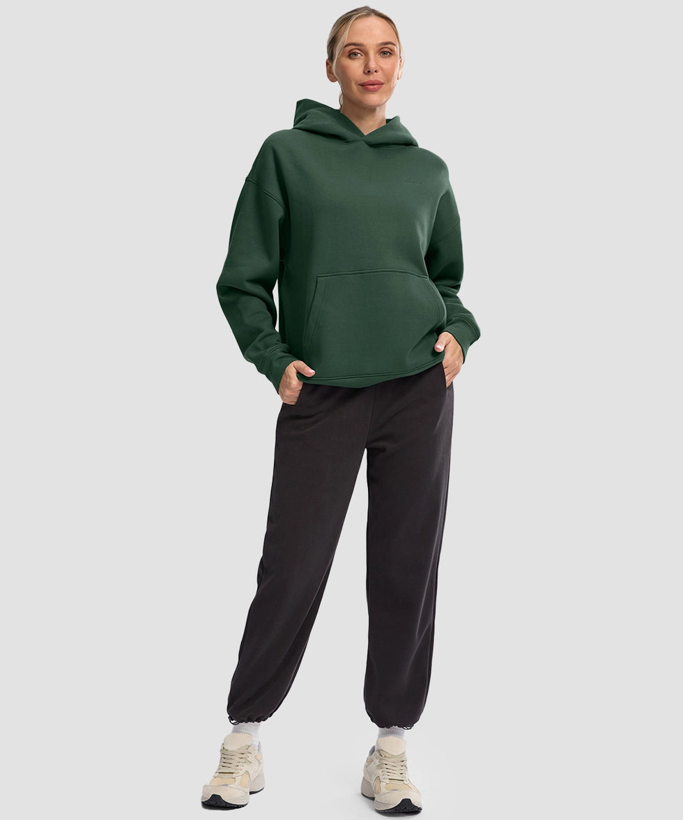 women's solid color oversized fleece hoodie in dark green - matching outfits view