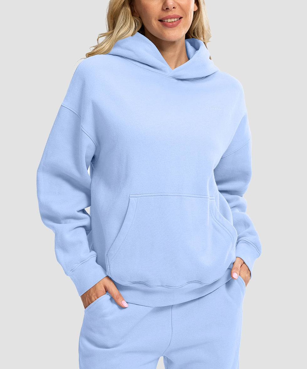 women's solid color oversized fleece hoodie in light blue - front view