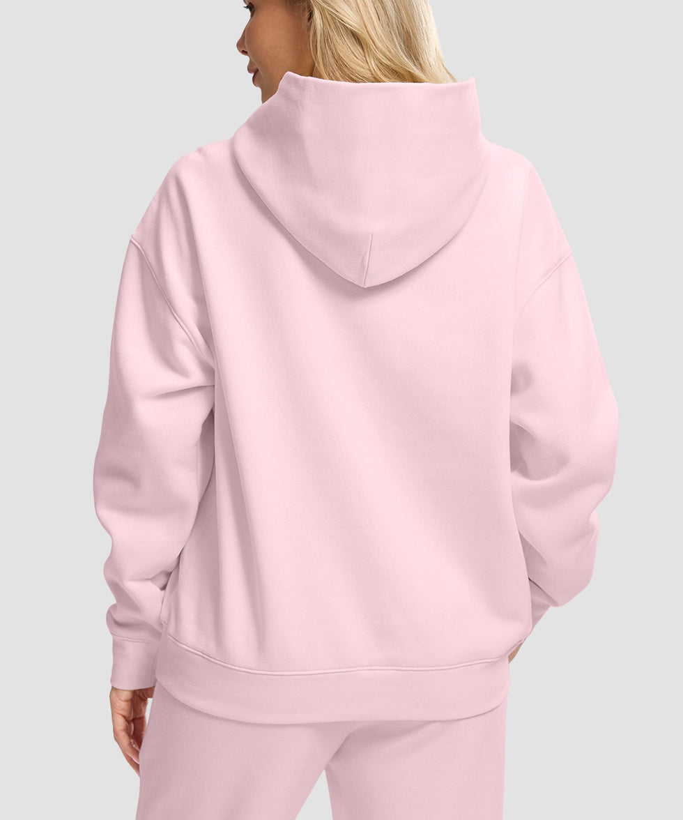 women's solid color oversized fleece hoodie in pink - back view