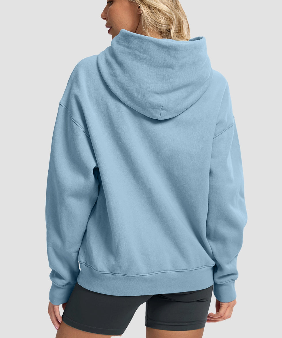 women's solid color oversized fleece hoodie in slate blue - back view