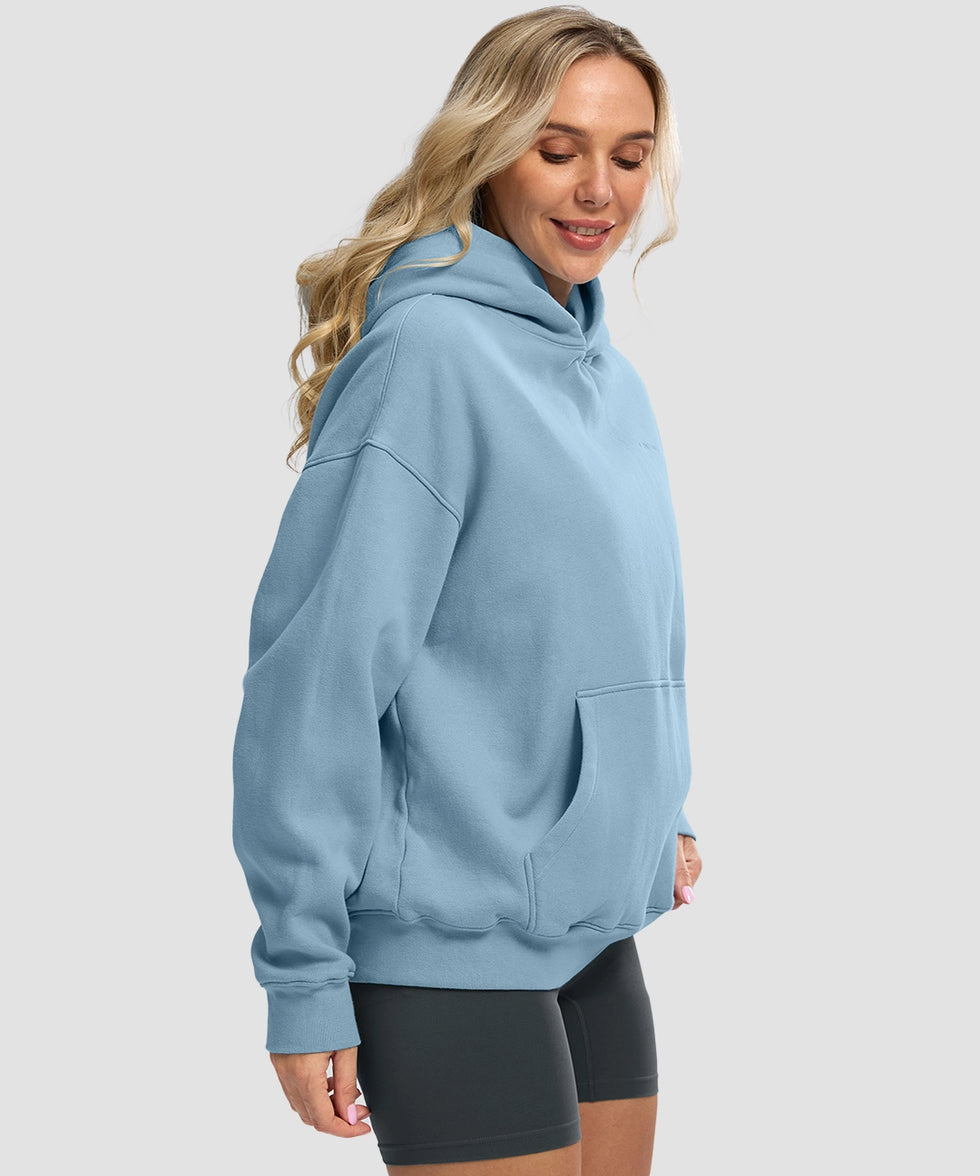 women's solid color oversized fleece hoodie in slate blue - side view
