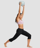 women's straight leg yoga capri pants in black - side view