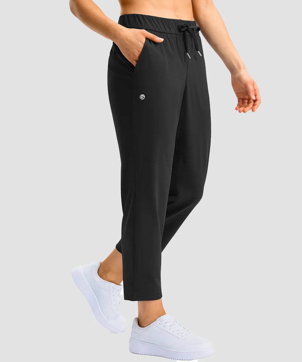 women's stretchy waist with pocket ankle pants in black - side view