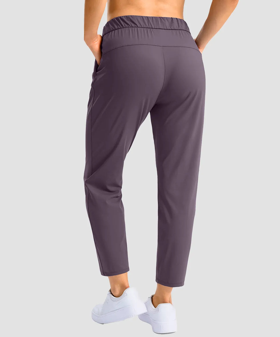 women's stretchy waist with pocket ankle pants in dusty purple - back view