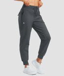 women's thermal with 3 zip pockets joggers in dark gray - front view
