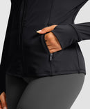 women's zip-up slim fit hip length jacket in black - zipper pocket detail view