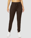 zipper pocket tapered joggers in brown - front view