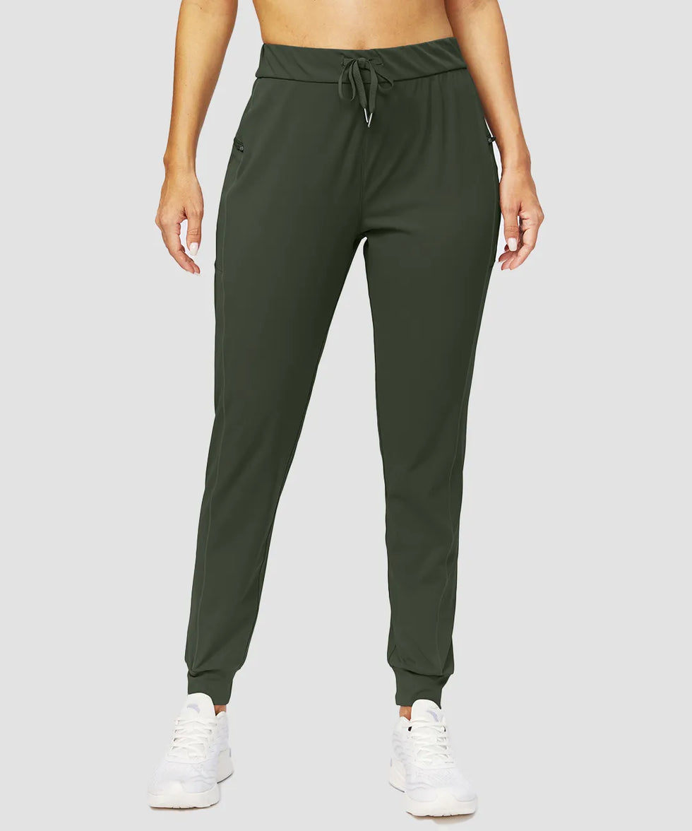 zipper pocket tapered joggers in olive green - front view