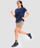 elastic waist bermuda shorts 5" in khaki - on model exercise view