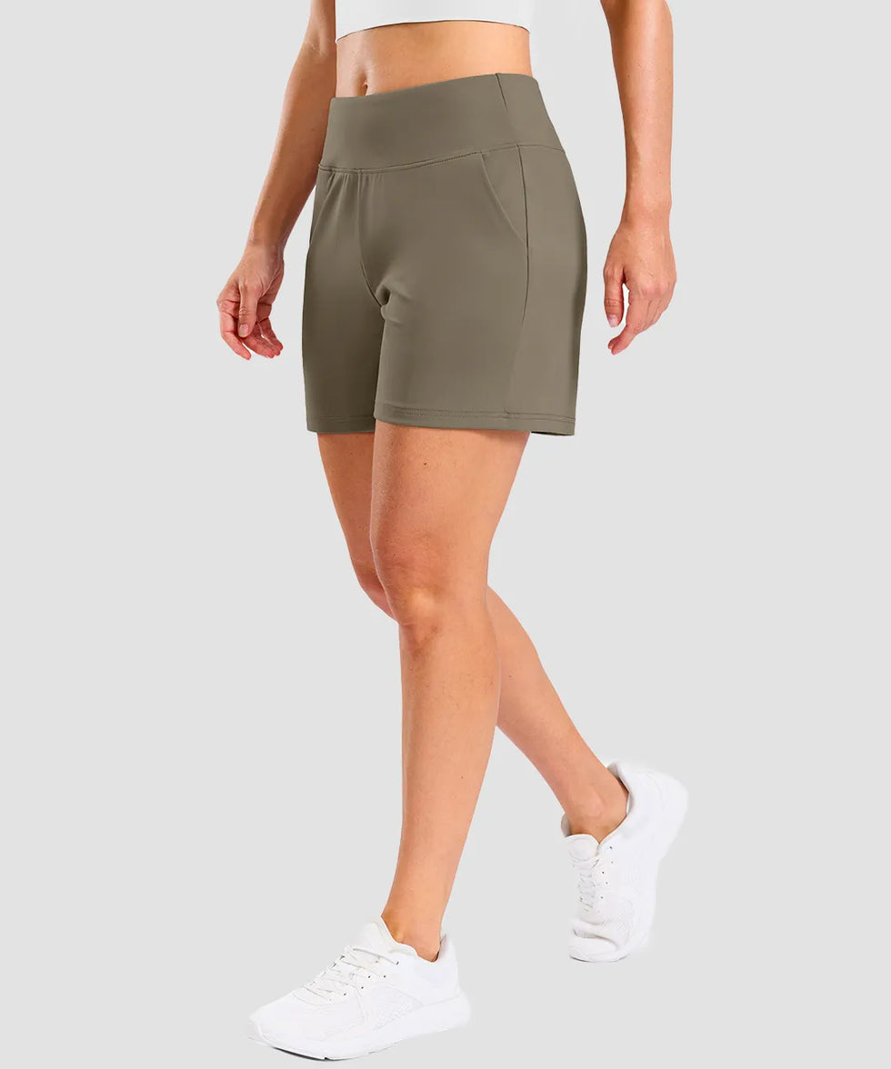 elastic waist bermuda shorts 5" in olive khaki - on model side view