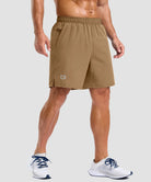 elastic waist split hem shorts 7'' in dark khaki on model - front view
