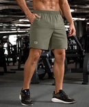 elastic waist split hem shorts 7'' in gray sage on model - front view