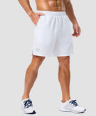 elastic waist split hem shorts 7'' in white on model - front view