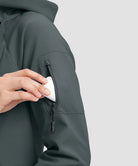 fleece-lined softshell jacket in dark gray - pocket detail view