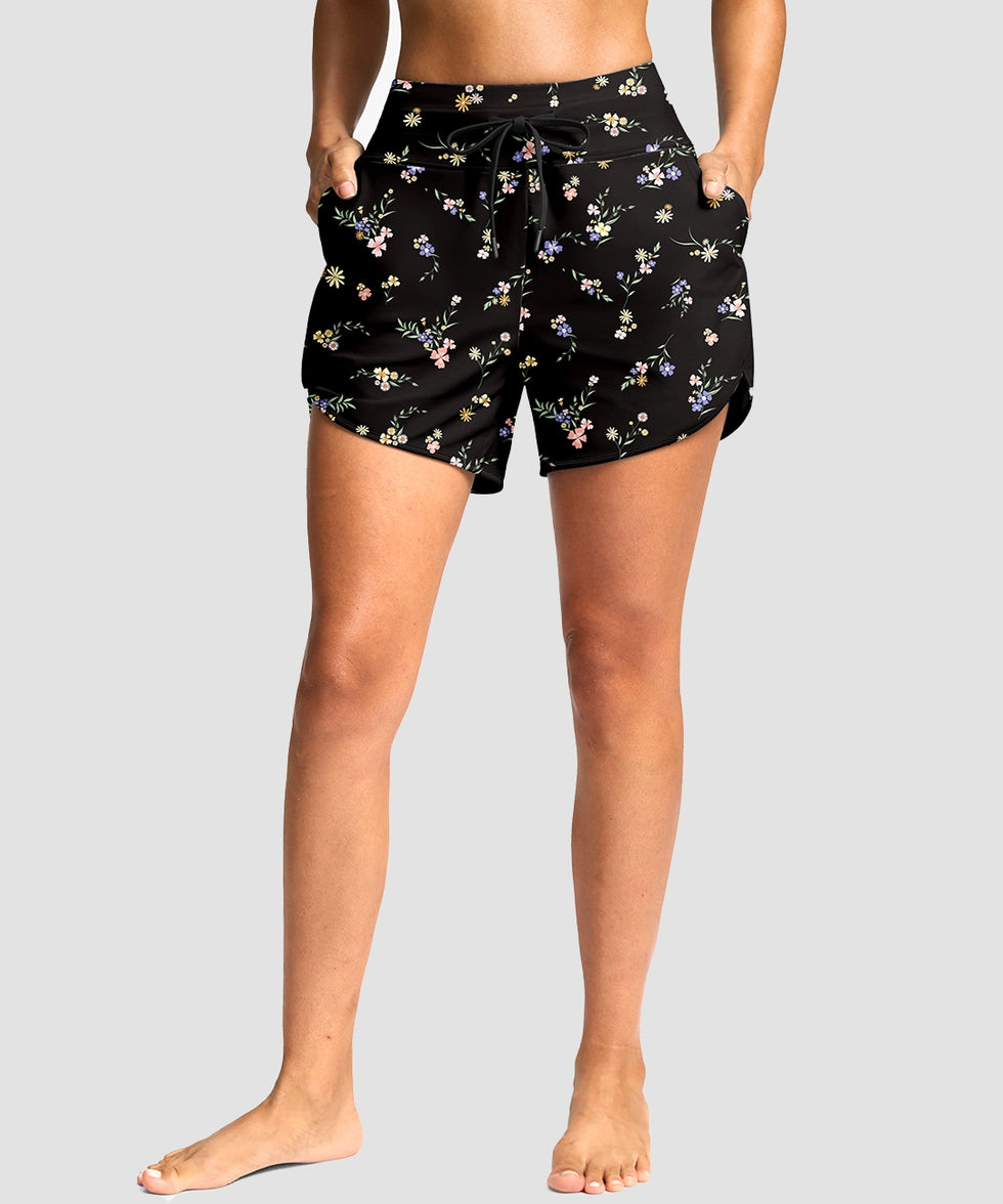 g-drykit™ high waisted pocket swim shorts in black flower - on model front view