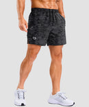 lightweight 5 inch pocketed athletic shorts in black camo - on model front view