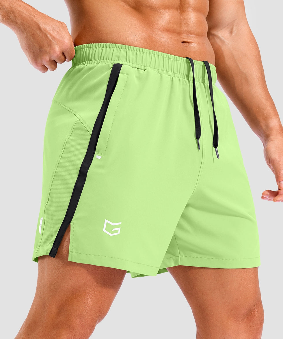 lightweight 5" pocketed athletic shorts in bright green - side view