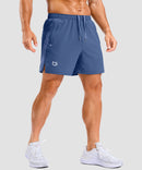 lightweight 5" pocketed athletic shorts in dusty blue - on model front view