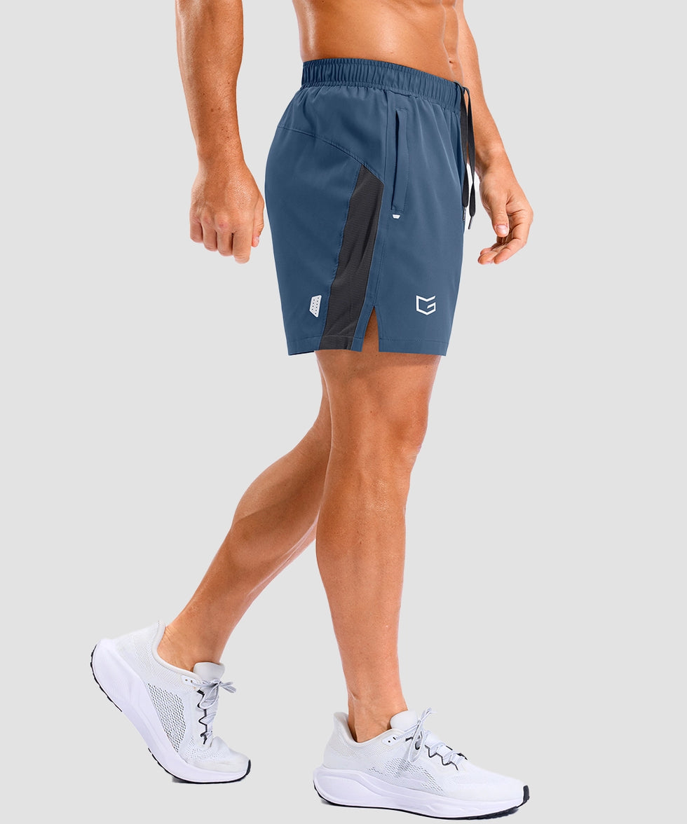 lightweight 5" pocketed athletic shorts in gray blue - on model side view