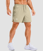 lightweight 5" pocketed athletic shorts in light khaki - on model front view