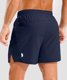 lightweight 5" pocketed athletic shorts in navy - back view
