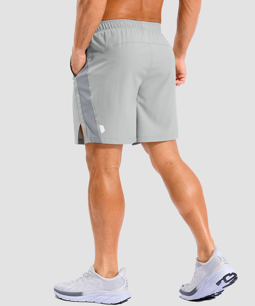 lightweight 7" pocketed athletic shorts in bright gray - on model back view