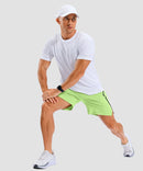 lightweight 7" pocketed athletic shorts in bright green - on model view
