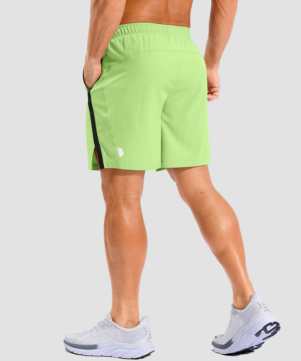lightweight 7" pocketed athletic shorts in bright green - on model back view