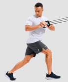lightweight 7" pocketed athletic shorts in dark gray - on model view