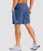 lightweight 7" pocketed athletic shorts in dusty blue - on model back view