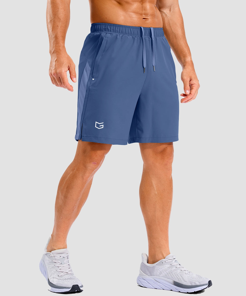 lightweight 7" pocketed athletic shorts in dusty blue - on model front view