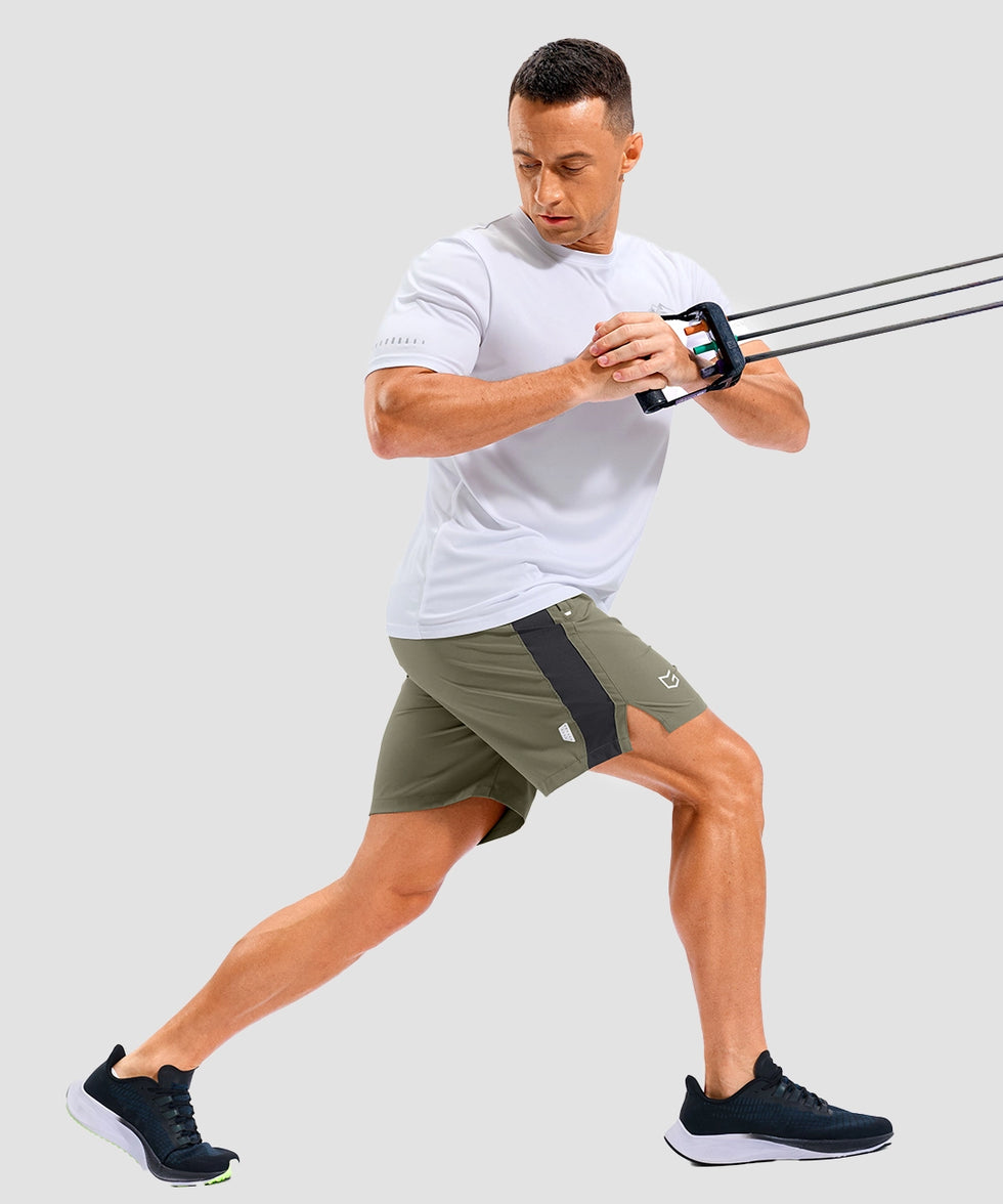 lightweight 7" pocketed athletic shorts in gray sage - on model view