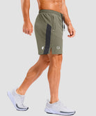lightweight 7" pocketed athletic shorts in gray sage - on model side view