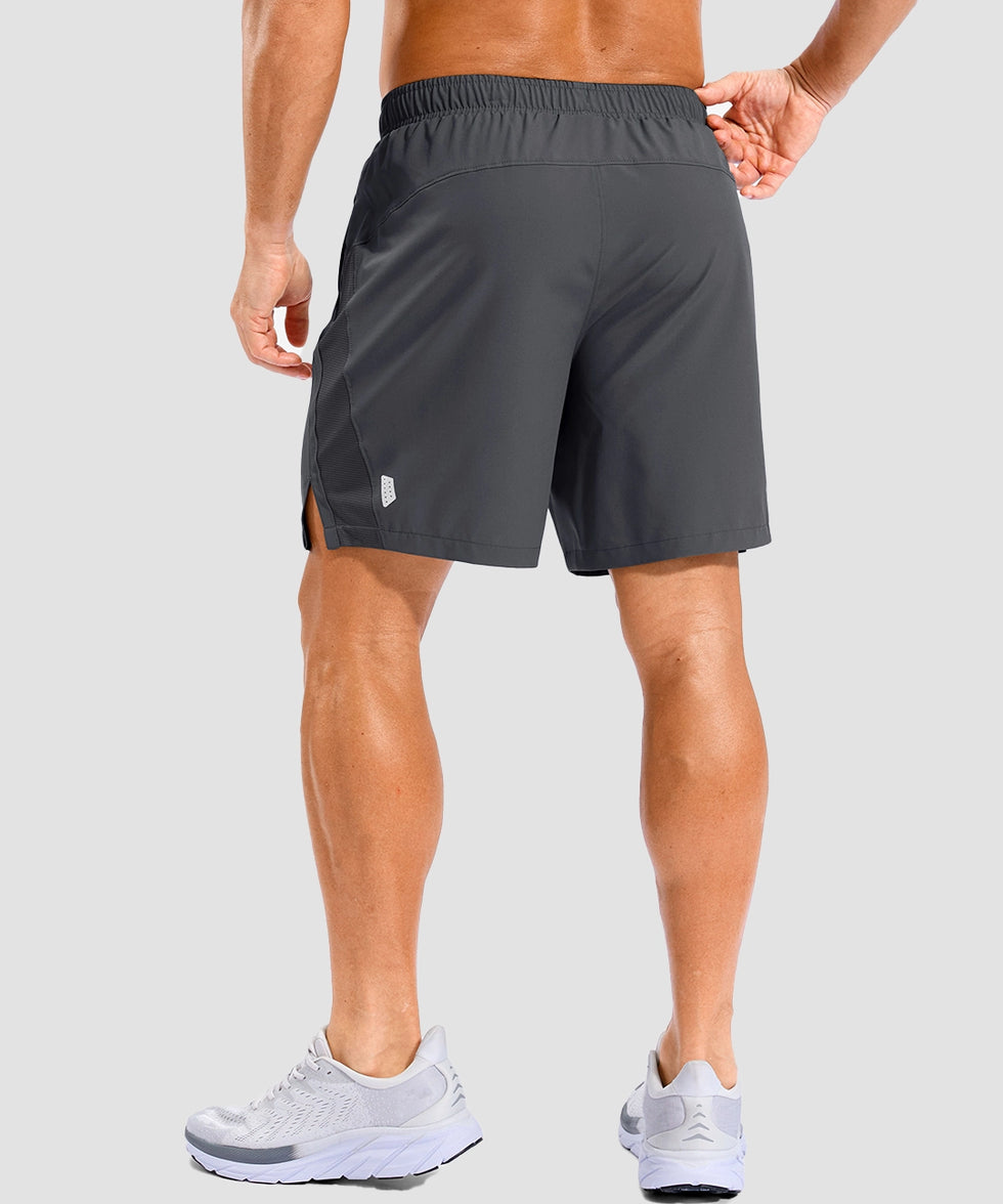 lightweight 7" pocketed athletic shorts in dark gray - on model back view