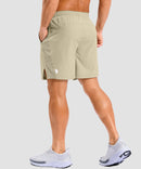 lightweight 7" pocketed athletic shorts in light khaki - on model back view