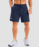 lightweight 7" pocketed athletic shorts in navy - on model front view